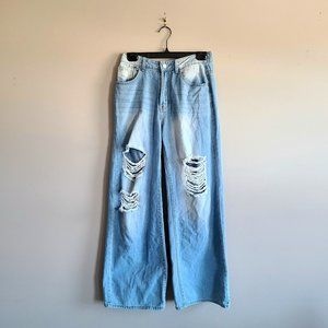 High waisted wide leg ripped blue jeans.